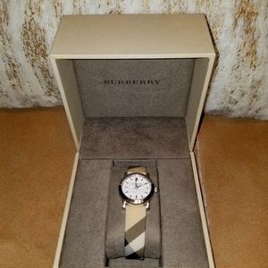 Burberry watch BU1387 with petite silver dial face and Heritage Nova check band